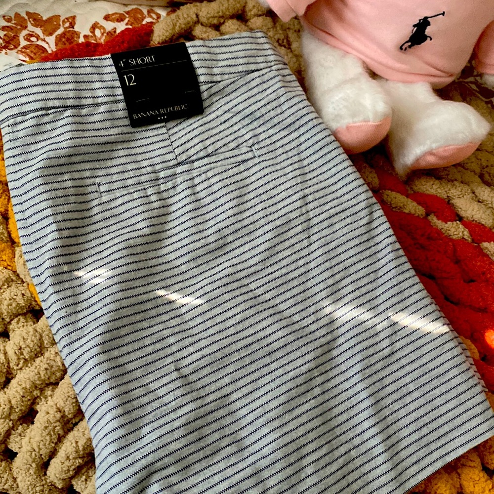 Banana Republic 4” inch double side button shorts.